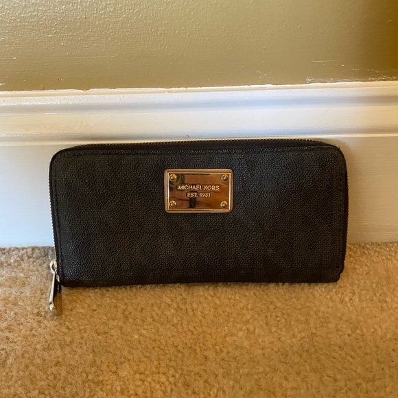 Michael Kors Handbags - Michael Kors black zip wallet
